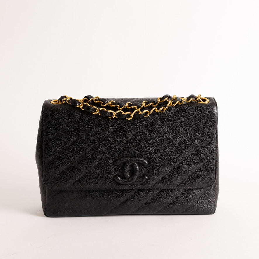 Chanel Vintage Black Caviar Jumbo Flap